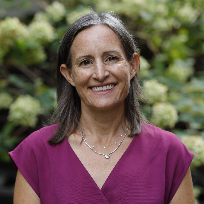 Meg Egan smiling in a photo